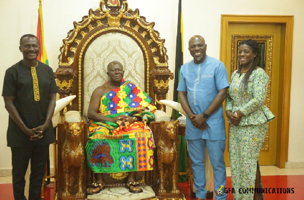 Asantehene Otumfuo Osei Tutu II flanked by members of the FA Cup Organising Committee