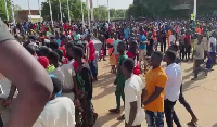 Volunteers outside a stadium in Niamey