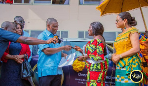 George Mireku Duker presented the car to the best teacher in Tarkwa