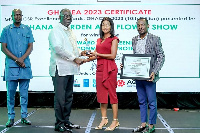 Stratcomm Africa Marketing Communication Manager, Sharon Anim, right, receiving the award