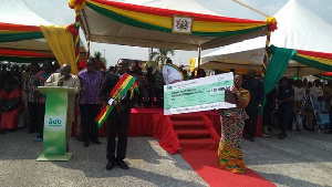 Philip Kweku Agyemang [left] was given a cheque for US$100,000 as the grand prize.