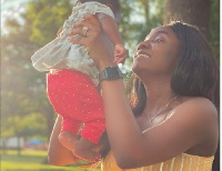 Singer Simi and baby, Deja