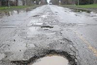 The road which was constructed in 2014 has become a death trap to residents