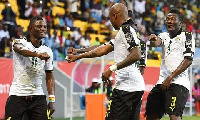 Andre Ayew and Asamoah Gyan celebrating a goal