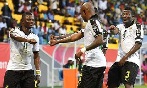 Andre Ayew and Asamoah Gyan celebrating a goal