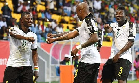 Andre Ayew and Asamoah Gyan celebrating a goal