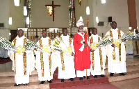 The newly-ordained priests in a group photograph with Most Reverend