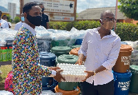 Prophet Albert Asihene Arjarquah presenting the items to Koforidua Prisons