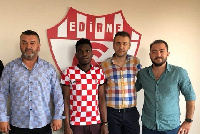 Omar Nuhu Bello (in a red and white shirt)