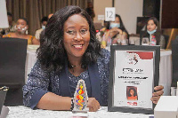 Mrs Gloria Opoku Anti with her plaque