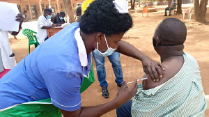 A man receives the Covid-19 jab in Yumbe District