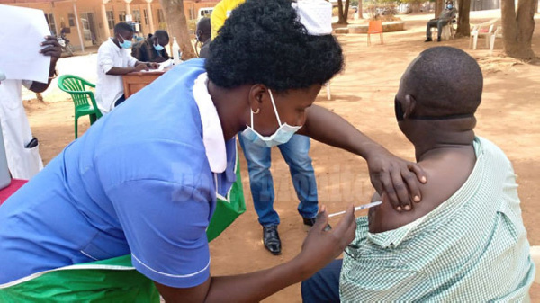 A man receives the Covid-19 jab in Yumbe District