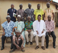 UDS officials in a group photo, and residents being attended to by nurses