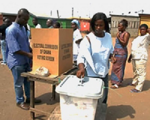 Woman casts her ballot.     File photo.