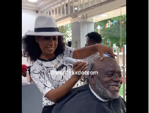 Selly Galley barbering Fred Amugi