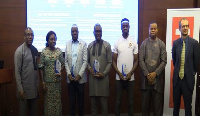 Award winners in a group photo with some dignitaries