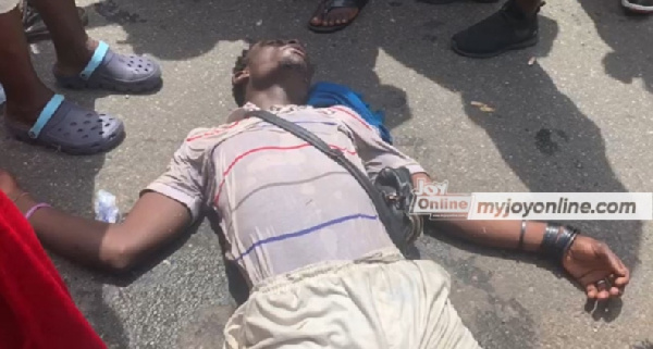 'Hands off our hotels' protester lying on the ground