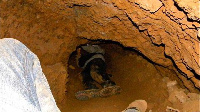 File photo of  a galamsey operator trapped in a pit