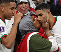 Saida Mouh kissing her son  Achraf Hakimi