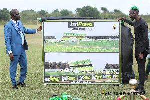 Kurt Okraku and Mr Eazi doing the sod cutting