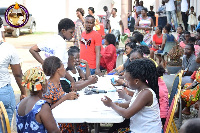 Some of the beneficiaries going through the registration process