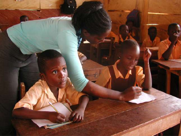 Teacher engaging pupils in rural Ghana