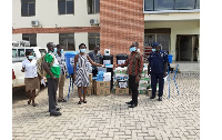 Hon. Ignatius Asaah Mensah handing over the donated items