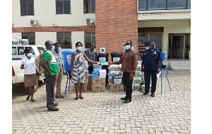 Hon. Ignatius Asaah Mensah handing over the donated items