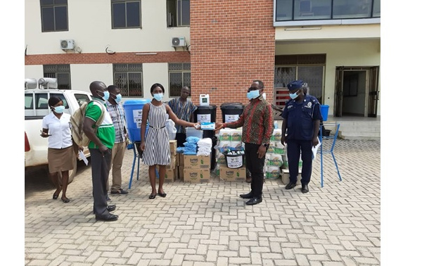 Hon. Ignatius Asaah Mensah handing over the donated items