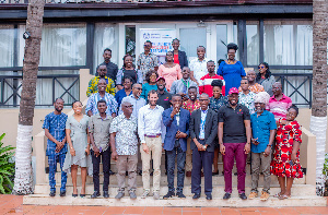 Journalists with some facilitators in a group photo