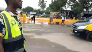 Local residents rushed to the scene with containers to collect the spilled oil