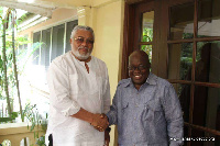 Former President Jerry John Rawlings in a handshake with President-elect Nana Akufo-Addo