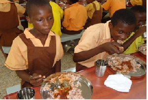 School pupils enjoying government free hot meal per day