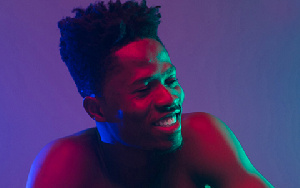 Kwesi Arthur Purp.png