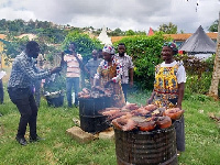 Some women displaying their smoked fish at the commission's open day