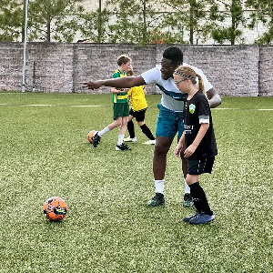 Asamoah Gyan during youth clinic