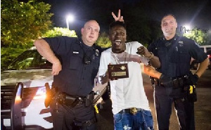 Shatta Wale poses with American policemen