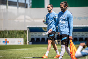 Uruguay defender, Diego Godin(with the bottle) in training