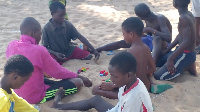 Children playing at the beach in Ketu South