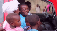 William Mehuadzo captured in a picture with his wife and children