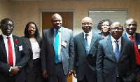 Management of Guaranty Trust Bank (Ghana) Limited with BoG governor, Dr. Ernest Kwamina Yedu Addison