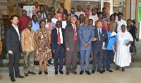 Mr Tripathi (third from right) with Mr Shah (middle) and other participants after the symposium