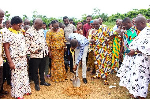 Sod cutting for the construction of a boys dormitory for Tweapease SHS