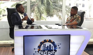 Kwesi Kwofie (Left), CEO of Dataware speaking GhanaWeb TV BizTech