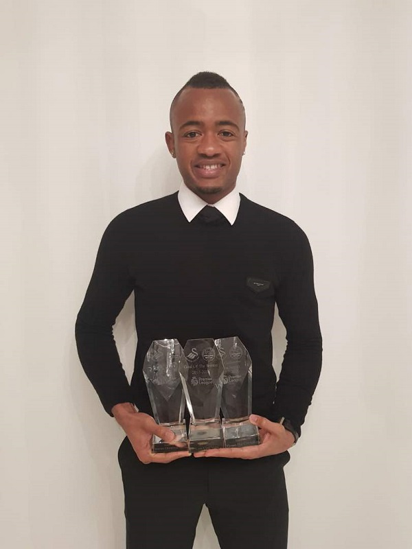 Jordan Ayew with all the three awards he won at Swansea City awards