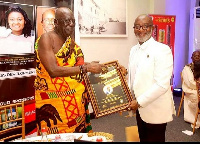 Yofi Grant (right) receiving his honorary award