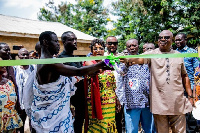 Cynthia Mamle Morrison, Agona West MP, cuts tape to commission one of the projects in Edukrom