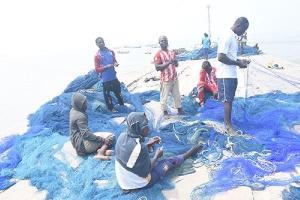 Some Of The Fishermen Mending Their Nets At James Town Photo Seth Osabukle