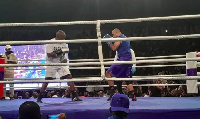 Azumah Nelson and Irchad Razaaly in the ring