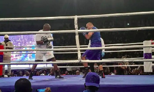 Azumah Nelson and Irchad Razaaly in the ring